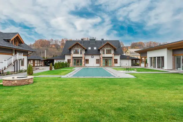 Modern home featuring asphalt shingles and clean roof lines