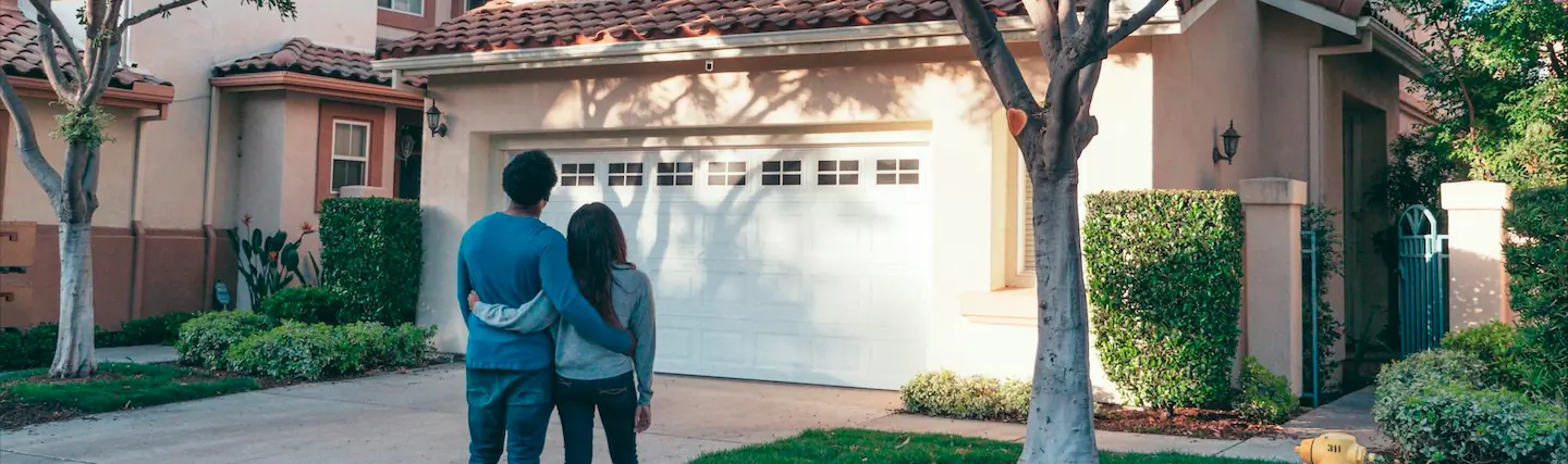 Couple Looking at New Roof